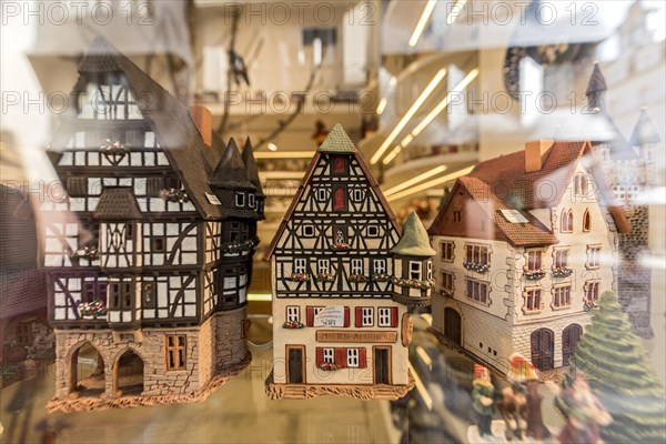Models of historic German half-timbered houses in a shop window