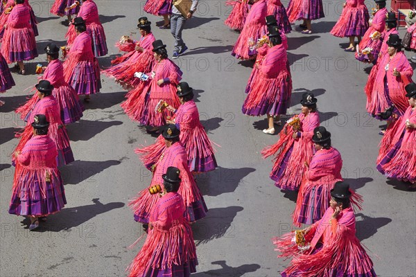 Dance group in traditional costumes at a parade