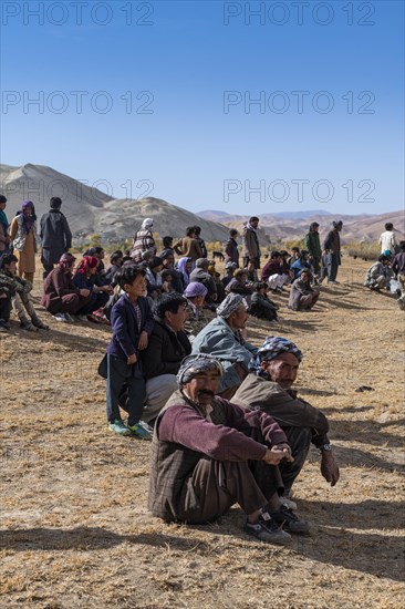 Spectators at traditional Buzkashi game