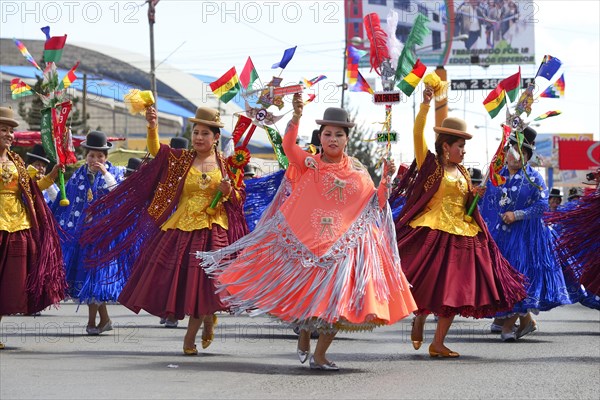 Dance group in traditional costumes at a parade