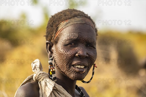 Scar face as a mark of beauty man from the Jiye tribe