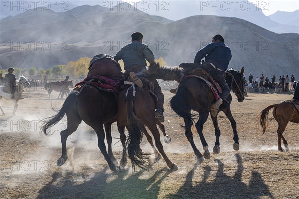 Men practising a traditional Buzkashi game