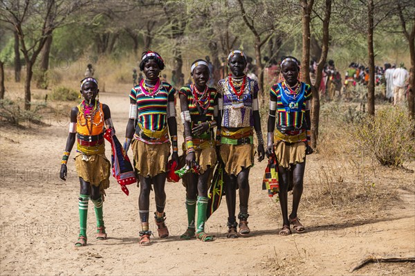 Traditional dressed young girls from the Laarim tribe