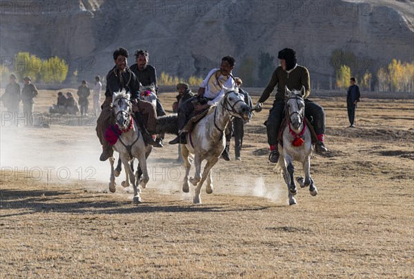 Men practising a traditional Buzkashi game