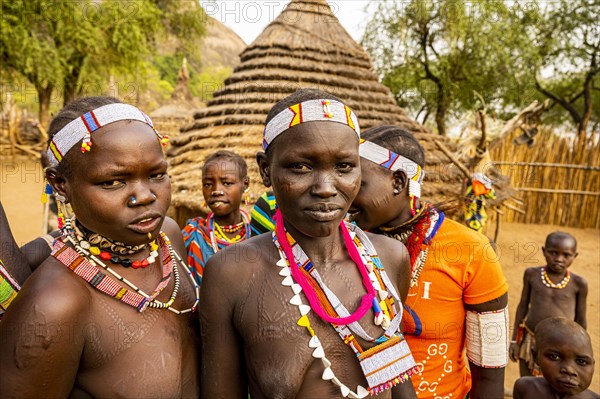 Traditional dressed young girls from the Laarim tribe