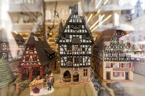 Models of historic German half-timbered houses in a shop window