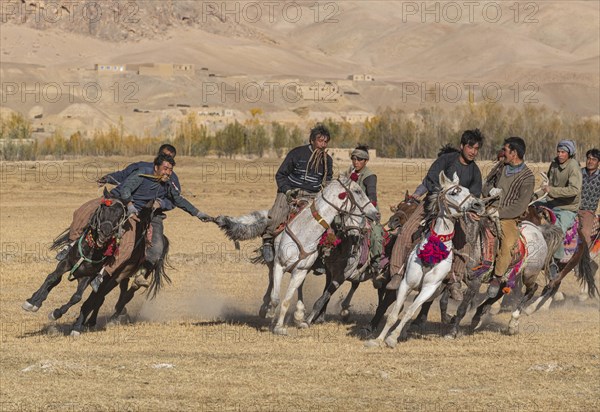 Men practising a traditional Buzkashi game