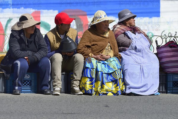 Seated spectators at a parade