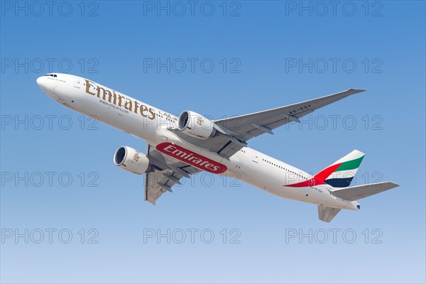 An Emirates Boeing 777-300ER aircraft with registration A6-EGY takes off from Dubai Airport