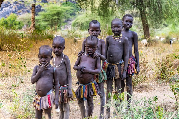 Young children standing in a row