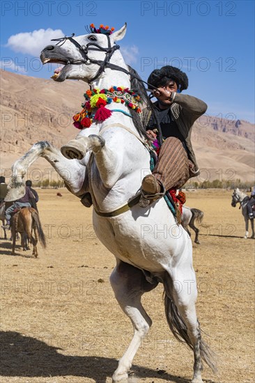 Men practising a traditional Buzkashi game