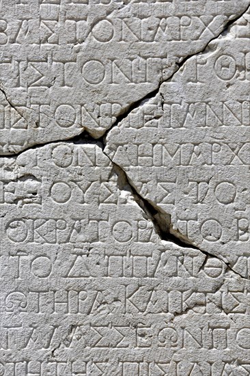 Ancient writing on marble plaque