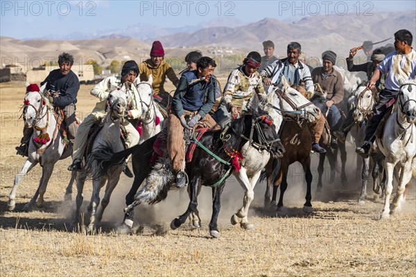 Men practising a traditional Buzkashi game