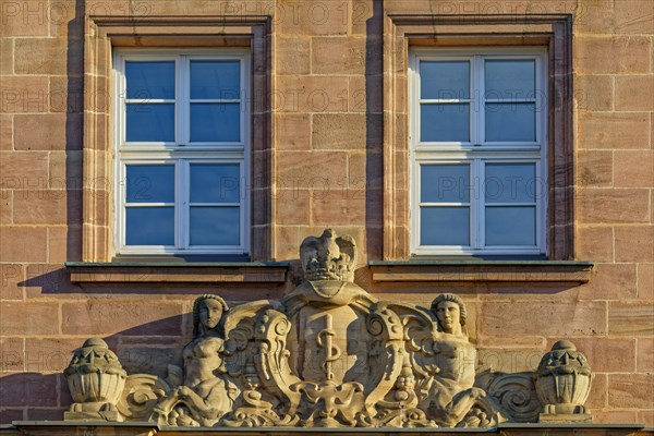 Relief on facade above house entrance