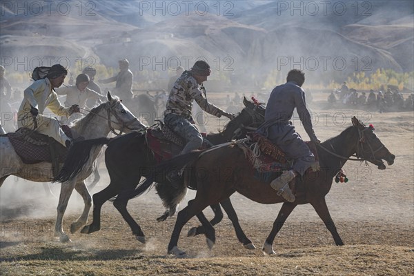 Men practising a traditional Buzkashi game