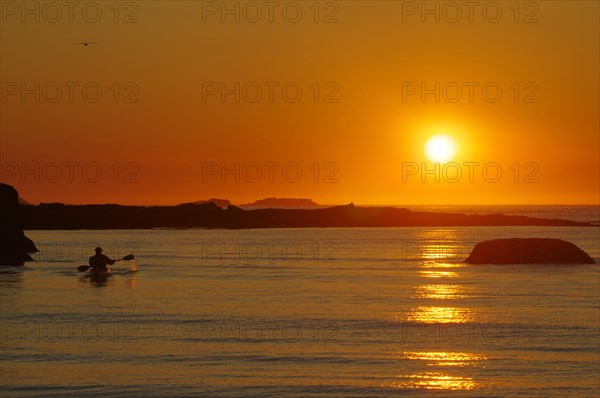 Kayaker and sea bay