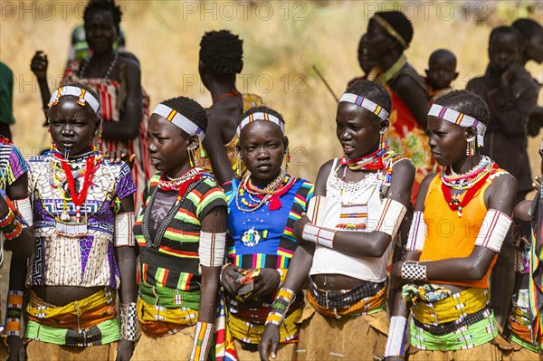 Traditional dressed young girls practising local dances