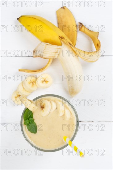 Banana Smoothie fruit juice drink juice in glass from above