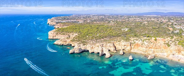 Portugal Algarve beach Praia da Marinha panorama sea ocean drone shot from above in Praia da Marinha