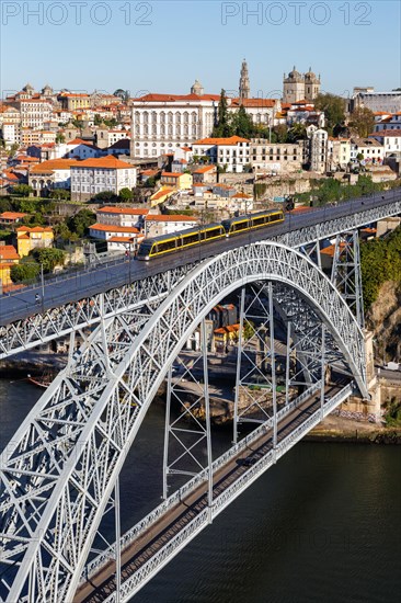 Porto with bridge Ponte Dom Luis I over river Douro and tramway travel city in Porto