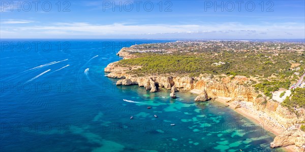 Portugal Algarve beach Praia da Marinha panorama sea ocean drone shot from above in Praia da Marinha