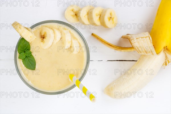 Banana Smoothie fruit juice drink juice in glass from above