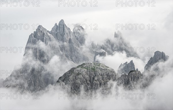 Cloudy rocky mountain peaks