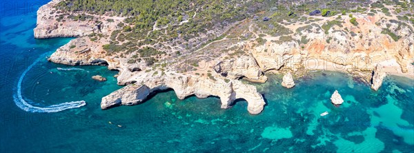 Portugal Algarve beach Praia da Marinha panorama sea ocean drone shot from above in Praia da Marinha