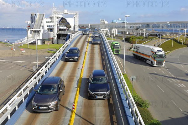 Cars and trucks depart from Ferry