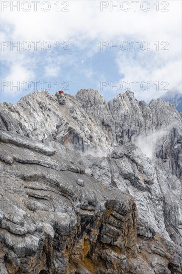 Bivouac hut on rocky mountain ridge