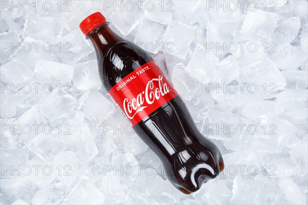 Coca Cola Coca-Cola in plastic bottle lemonade soft drink drink on ice cube ice cubes