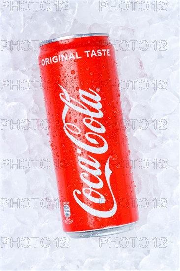 Coca Cola Coca-Cola can lemonade soft drink drink on ice cube cubes