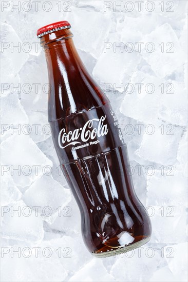 Coca Cola Coca-Cola bottle lemonade soft drink drink on ice cube cubes