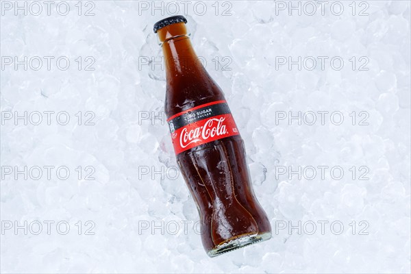 Coca Cola Coca-Cola Coke Zero Sugar in a bottle lemonade soft drink drink on ice cube ice cubes