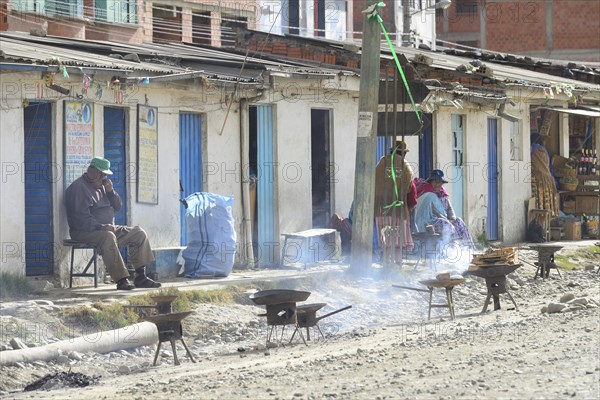 Cookshops on the street heat up their ovens