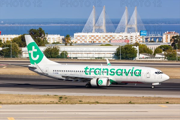 A Transavia Boeing 737-800 aircraft with registration F-GZHN at Lisbon Airport