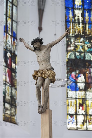 Christ figure and coloured windows