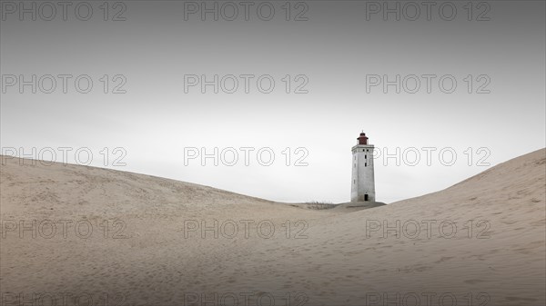 Lighthouse in the Rubjerg Knude shifting sand dune