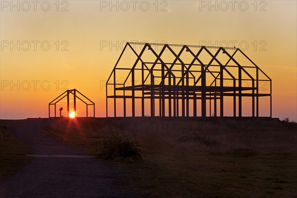 Hall house at sunrise on the North Germany slag heap
