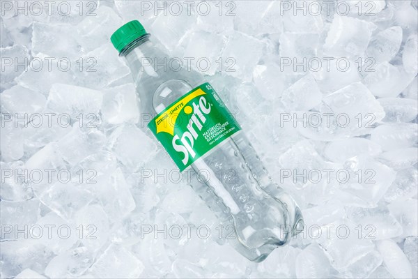 Sprite lemonade soft drink drink in a plastic bottle on ice cube ice cubes