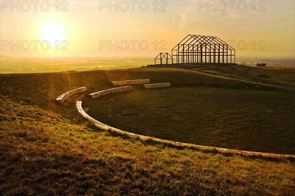 Hall house at sunrise on the North Germany slag heap