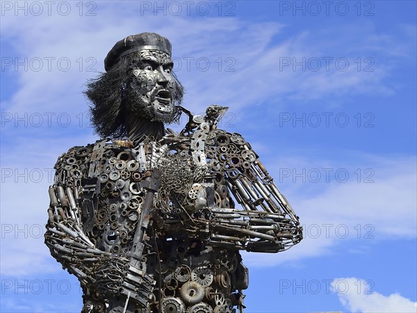 Ernesto Che Guevara as a statue made of engine parts