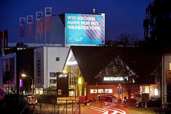 McDonald's and large poster Climate steel at the ThyssenKrupp Steel Bochum plant