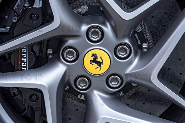 Forged rim with Ferrari logo horse