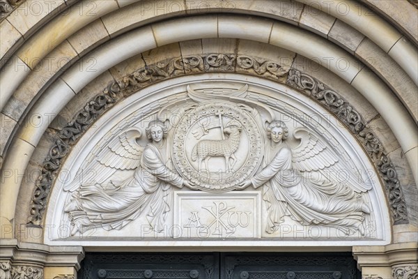Depiction of the Lamb of God above the portal of St. Peter's Cathedral