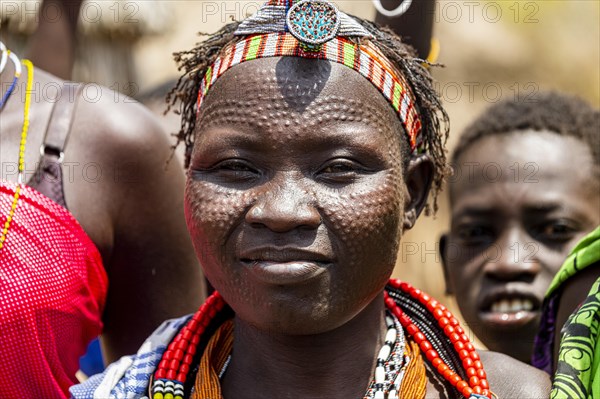 Woman with beauty scars from the Toposa tribe