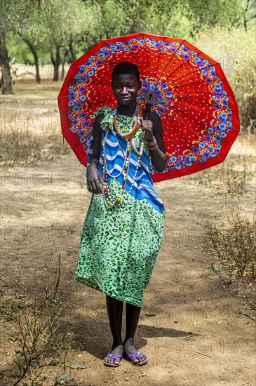 Girl carrying an umbrella