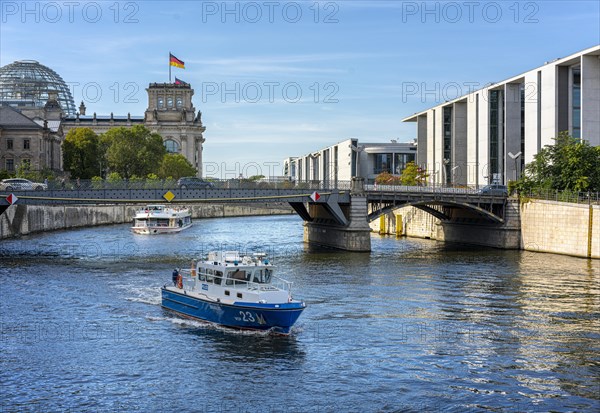 Boat of the water police on the Spree in Berlin's government district
