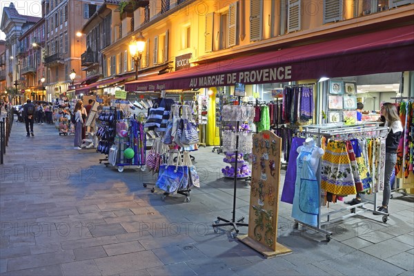 Evening hustle and bustle with restaurants and market stalls on the Cours Saleya