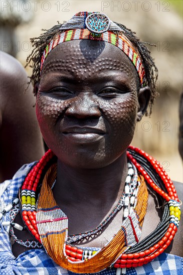 Woman with beauty scars from the Toposa tribe